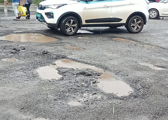 Mangaluru City Police Officials Close Potholes On Nanthur Road